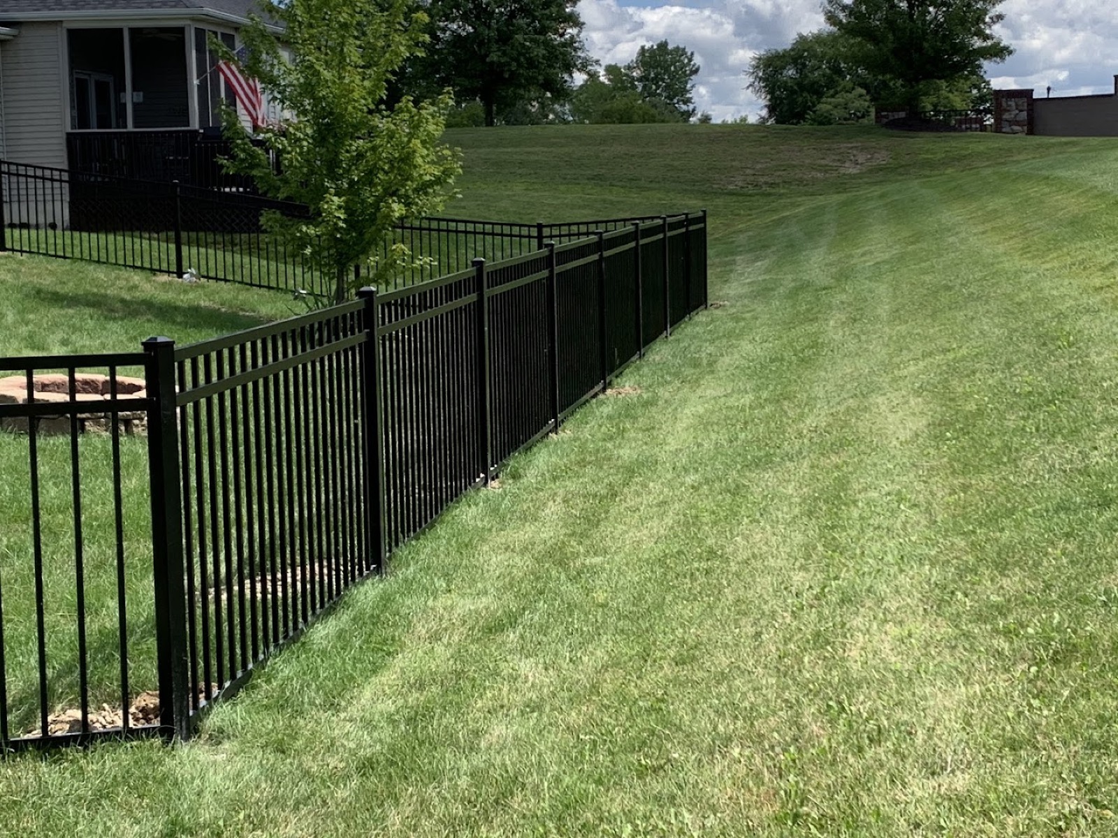 Black aluminum ornamental fencing in a Fort Wayne yard